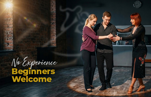 Senior couple attending dancing class in community center.